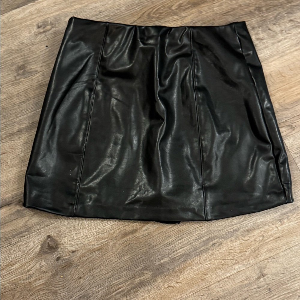 Abercrombie and fitch faux leathered skirt with attached shorts.